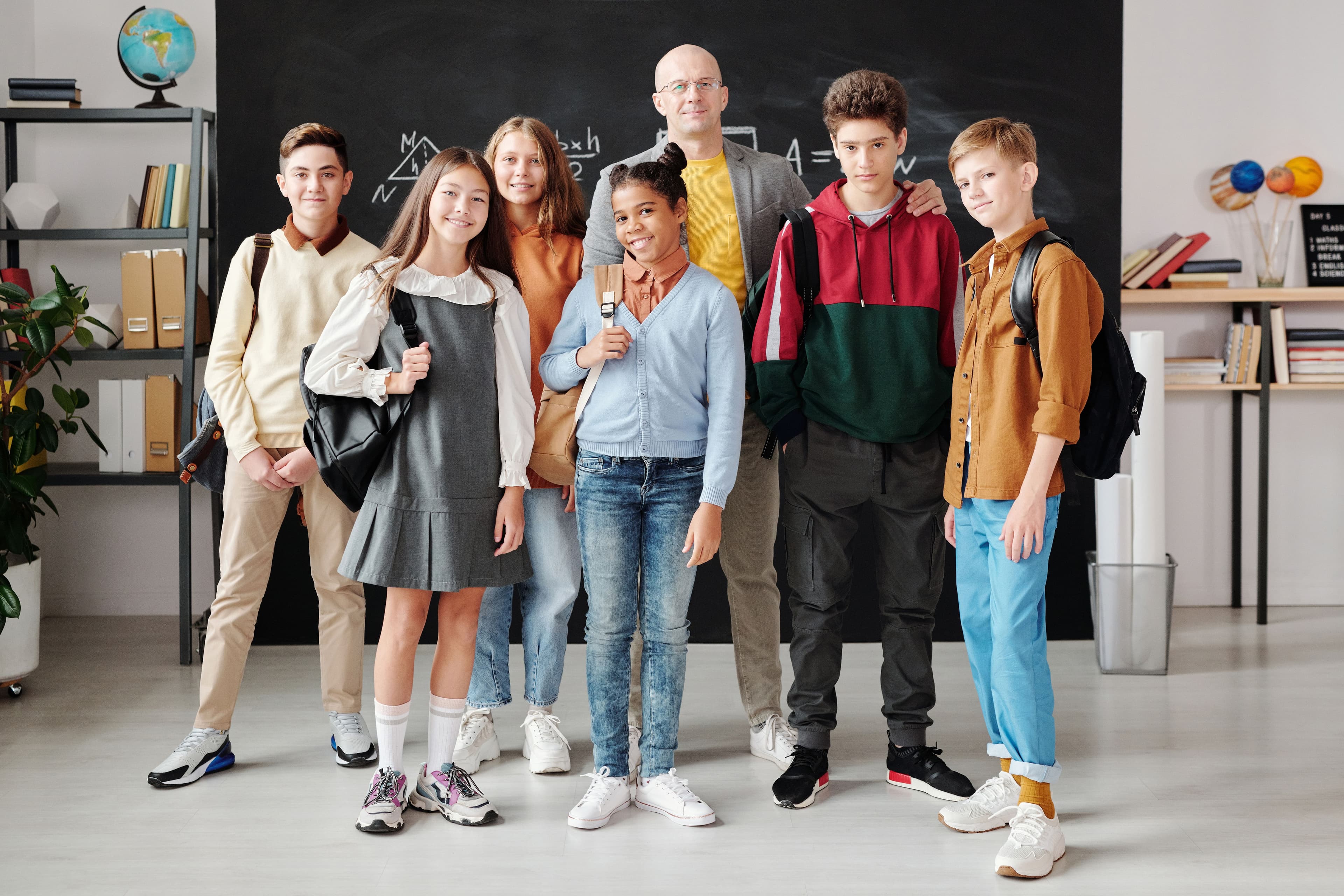 Intermediate students with teacher in classroom