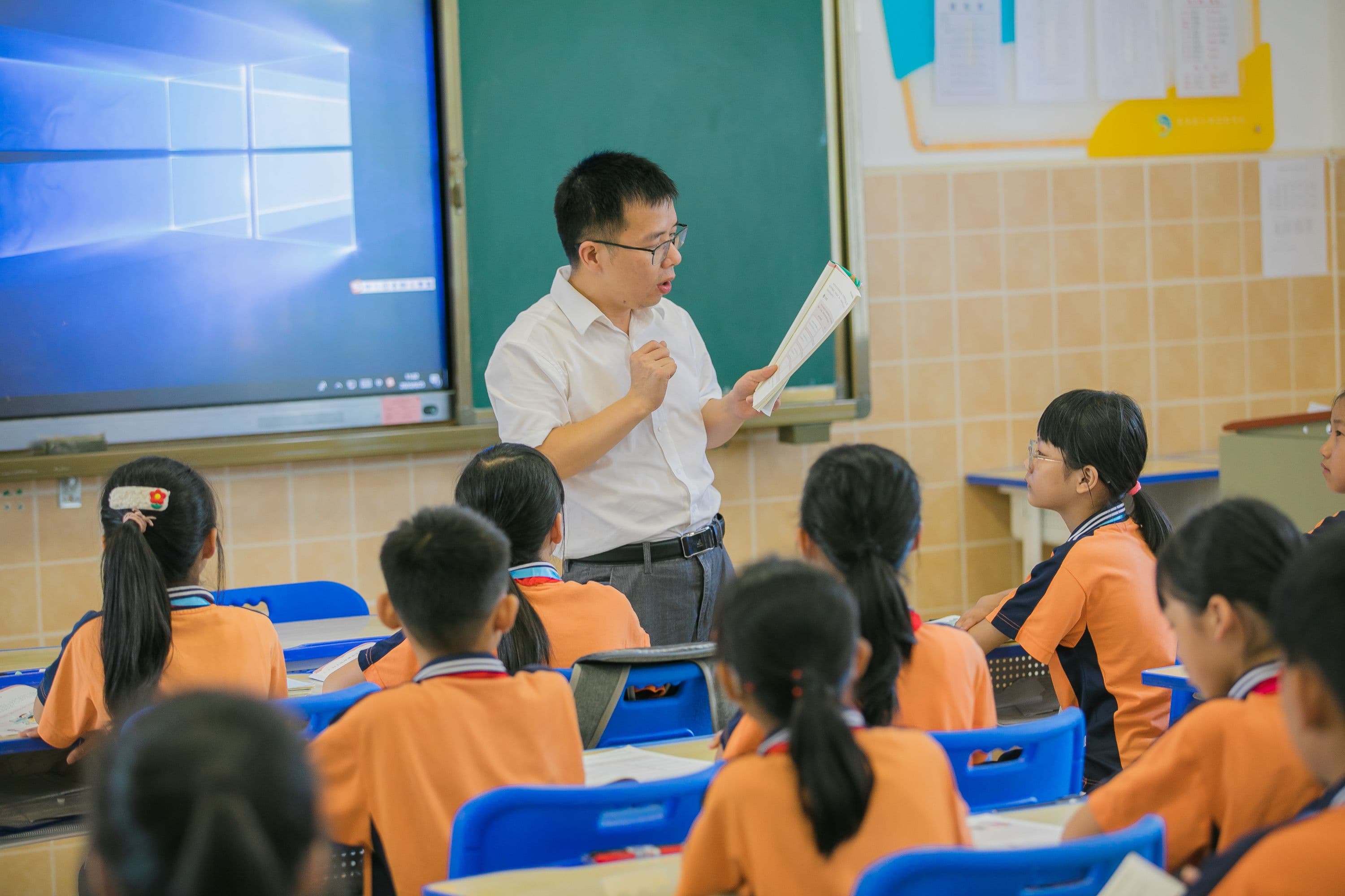 Middle school students engaged in a lesson